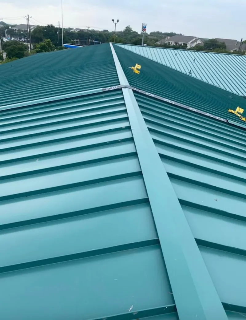 Green commercial metal roof ridge and valley for Metal Roof Repair in Lincoln Park