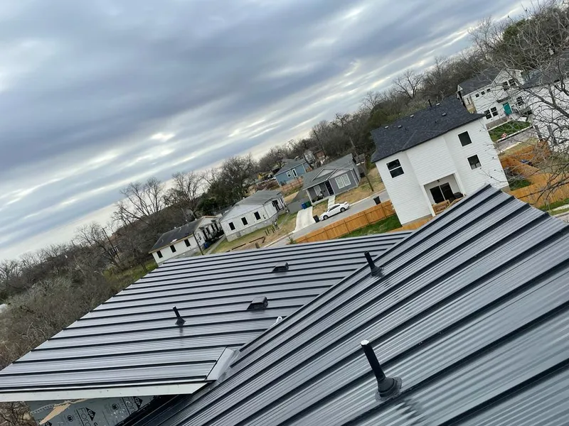 Standing seam metal roof panels with vents for Skylight Repair in Lincoln Park